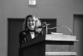 Photograph of Jan Walter at the podium during a creative writing workshop