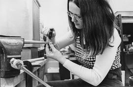 Photograph of a Creative Arts Student Sizing a Ring