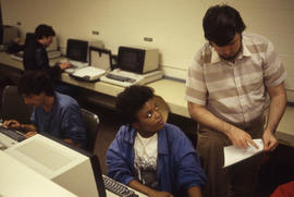 Photograph of students working in a computer lab