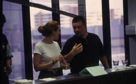 A photograph of students at the counter in the Bartending lab