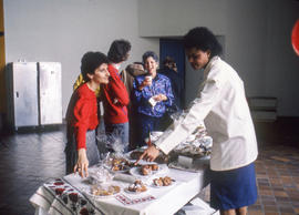 Photograph of Joanne Merigliano and Hyacinth James at a bake sale