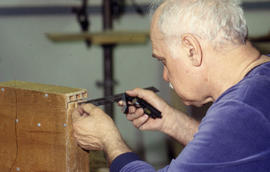Photograph of a student in the Cabinet Making / Woodworking program