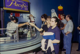 A photograph of students lining up for food at the Pacific Rim