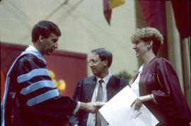 Photograph of a Student Being Handed Their Certificate at Convocation