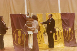 Photograph of Abby Hoffman and Robert "Tex" Noble Unveiling the Commemorative Plaque