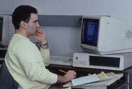 Photograph of a Graphics Design Student Using a Computer