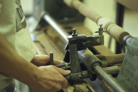 Photograph of lathe blade cutting machine in operation