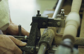 Photograph of lathe blade cutting machine in operation