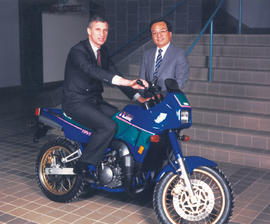 Photograph of Robert 'Squee' Gordon on a Yamaha motorcycle