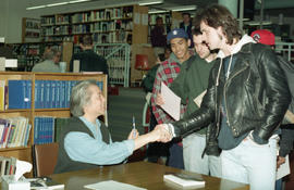 Photograph of Wayson Choy shaking hands