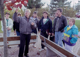 Photograph of a faculty member leading a class in the Arboretum
