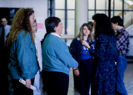 Photograph of Heather Howe meeting a group of people