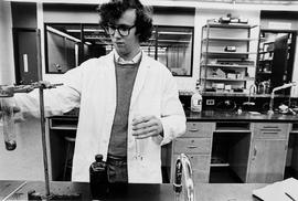Photograph of a Student Mixing Chemicals in the Lab