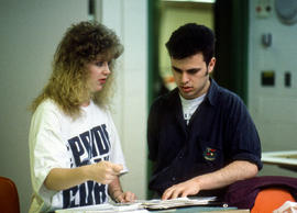 Photograph of two students in a classroom