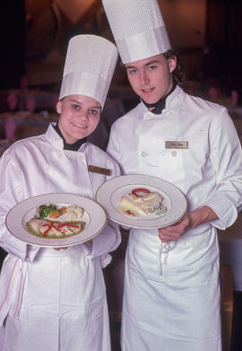 Photograph of hospitality students with food products