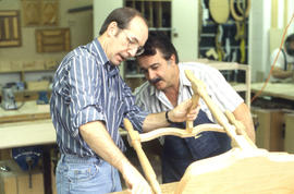 Photograph of two students in Cabinet/Woodworking lab