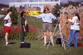 Photograph of photography students in the arboretum