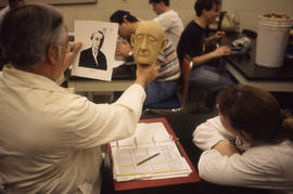Photograph of an Instructor With a Student