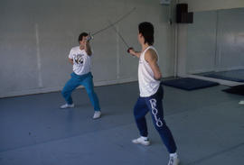 Photograph of students practicing fencing