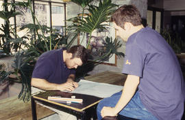 Photograph of a student working on landscape diagrams