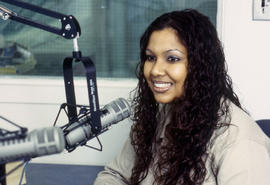 Photograph of student in Humber radio broadcasting studio