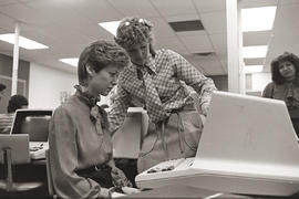 Photograph of word processing operator using the machine