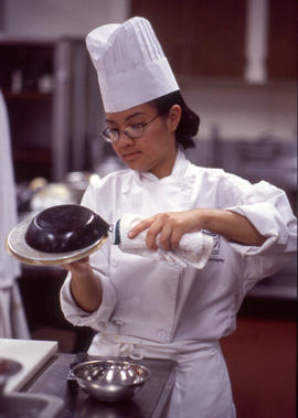 Photograph of culinary student at work