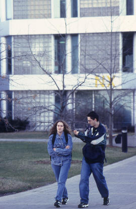 Photograph of students on the path infront of NX building
