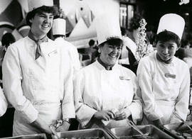 Photograph of Student Chefs Standing Behind the Buffet Table