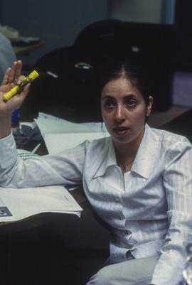 Photograph of a student at a lecture session