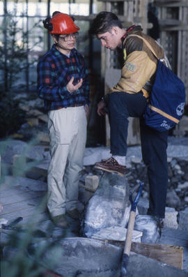 Photograph of a Landscape Worker Talking to Someone