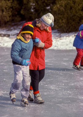 Photograph of a child learning to skate in the Arboretum