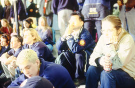 Photograph of students seated in the concourse