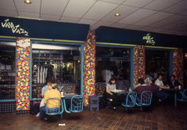 A photograph of people sitting in front of Java Jazz in Building H