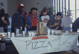 Photograph of a pizza eating contest