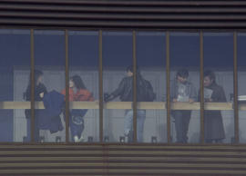 Photograph of students hanging out at the lockers