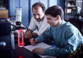 Photograph of two students in the Electronics lab
