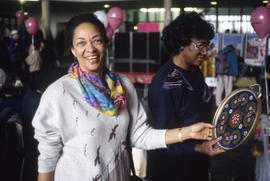 Photograph of People at the International Day Booths at the Concourse