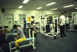 A photograph of users in the Athletic Centre on fitness equipment