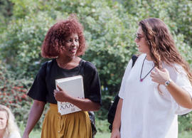 Photograph of two students in the Arboretum