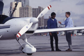 Photograph of an aviation instructor and a student at Billy Bishop