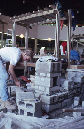 Photograph of a Landscaping student constructing a garden display