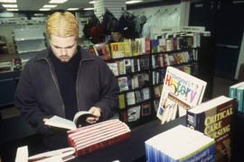 A photograph of a student in the Bookstore