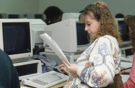 Photograph of a student working at a computer station