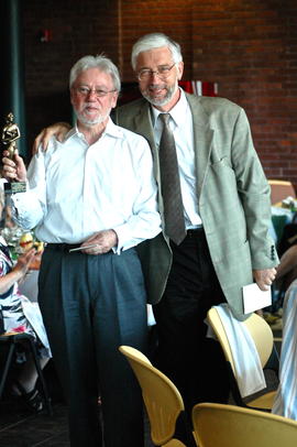 Photograph of John Metcalf with Calliope award