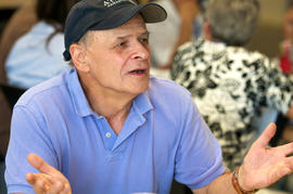 Photograph of Tim O'Brien talking to students