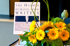 Photograph of centerpiece and Humber School for Writers sign