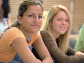 Photograph of two students in class at University of Guelph-Humber
